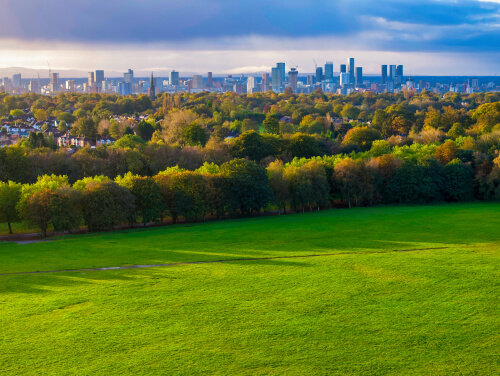 Aerial view of Heaton Park in Manchester with green grass and trees