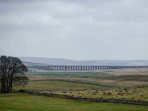 Arches of the Ribblehead Viaduct on a cloudy day in the Yorkshire Dales