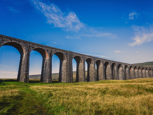 Arches of the Ribblehead Viaduct on a sunny day in the Yorkshire Dales